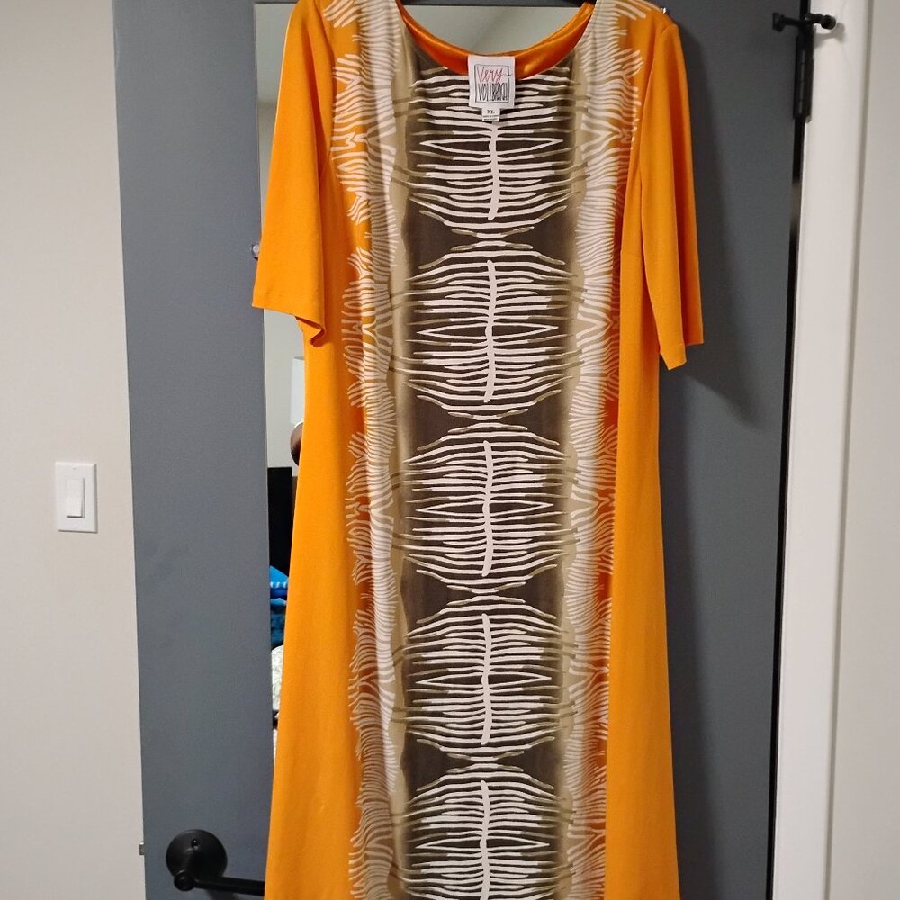 Beautiful, mustard and brown dress for all occasions, with a hint of cream